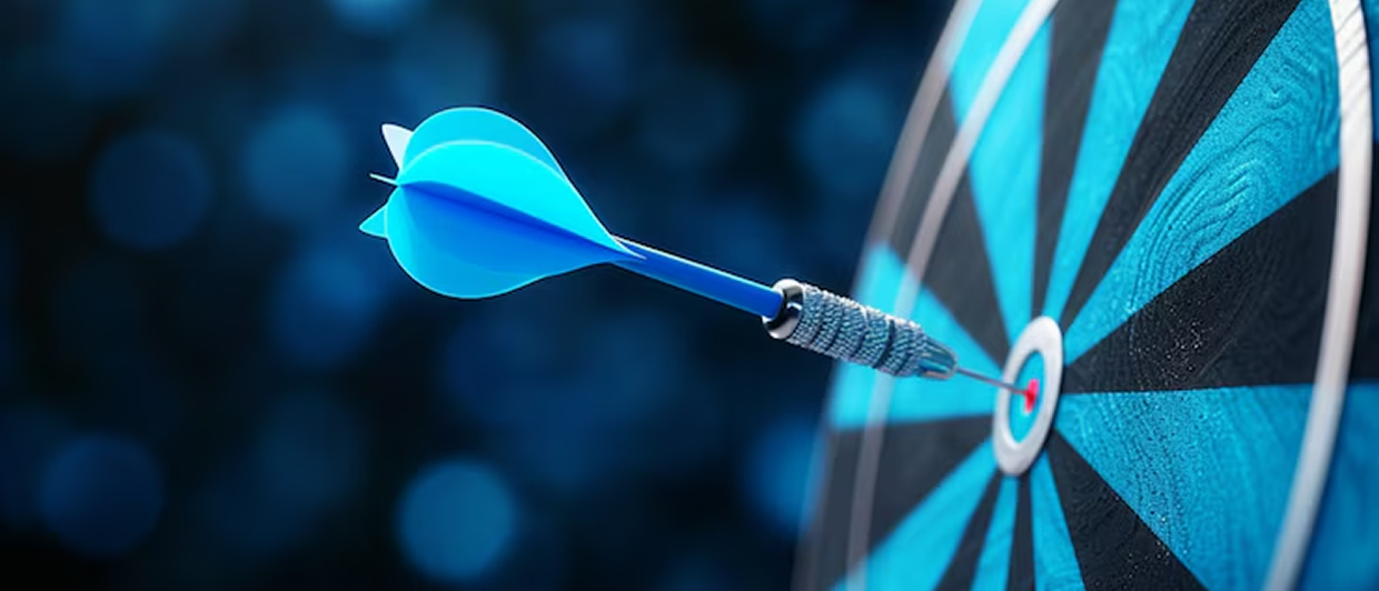 Dartboard with blue dart